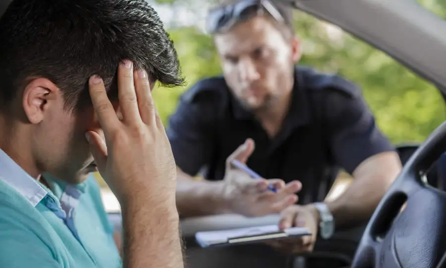 man getting a speeding ticket