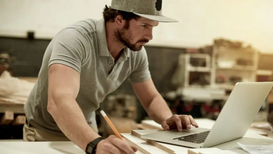 Solo Entrepreneur working in his shop.