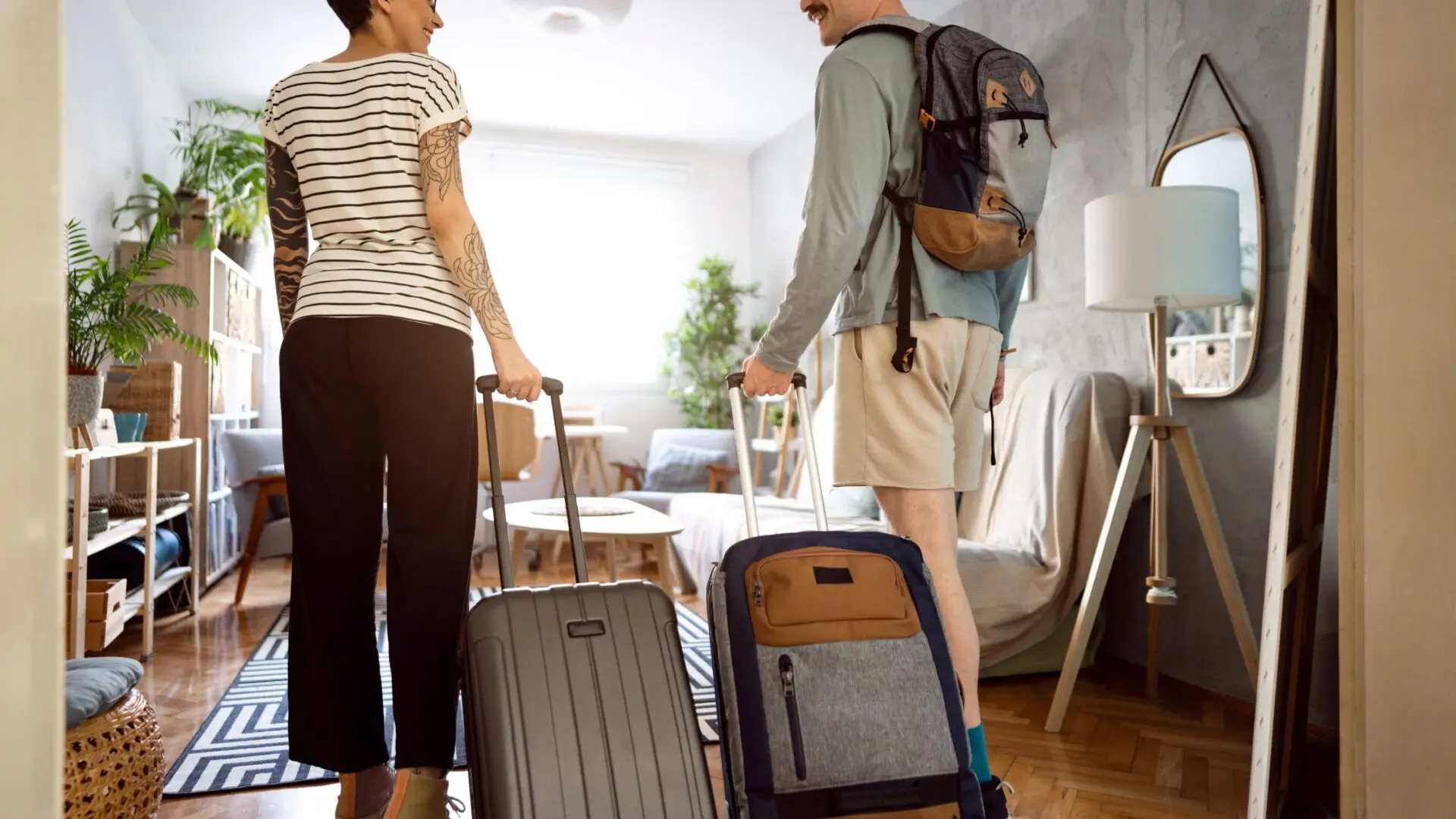 I couple checking into their AirBnB