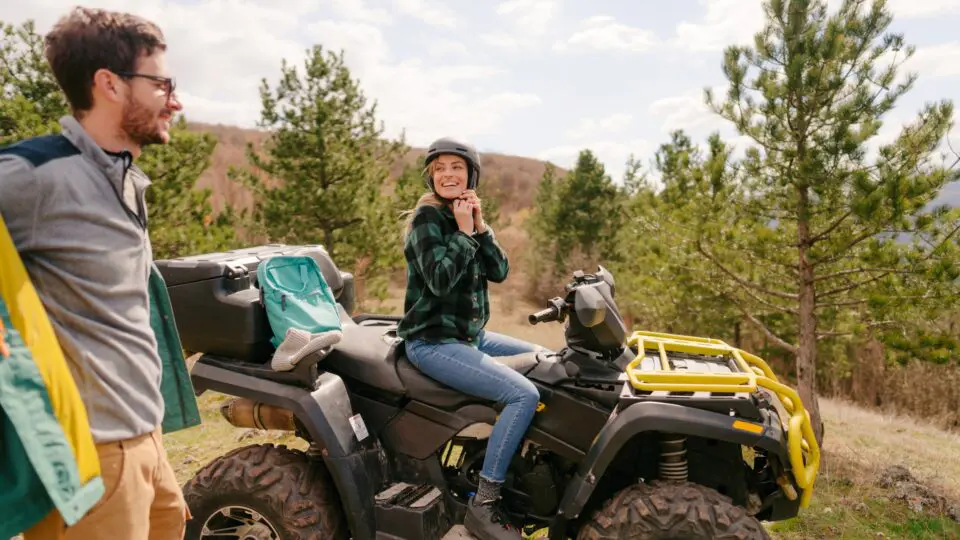 a woman on an ATV in the back country