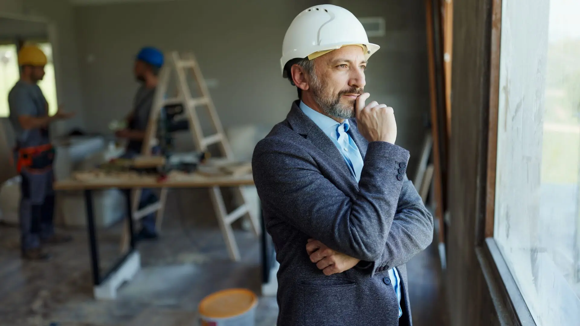 businessman considering his property development