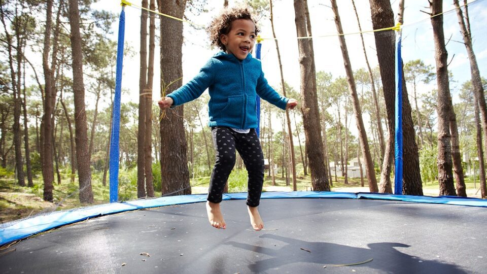 young girl on a trampoline