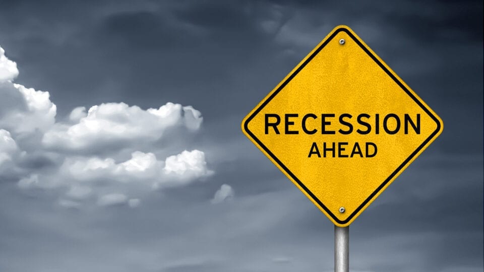 road sign recession ahead