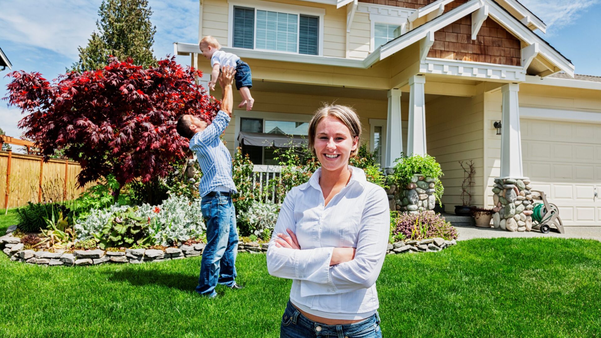 Family in front of their home