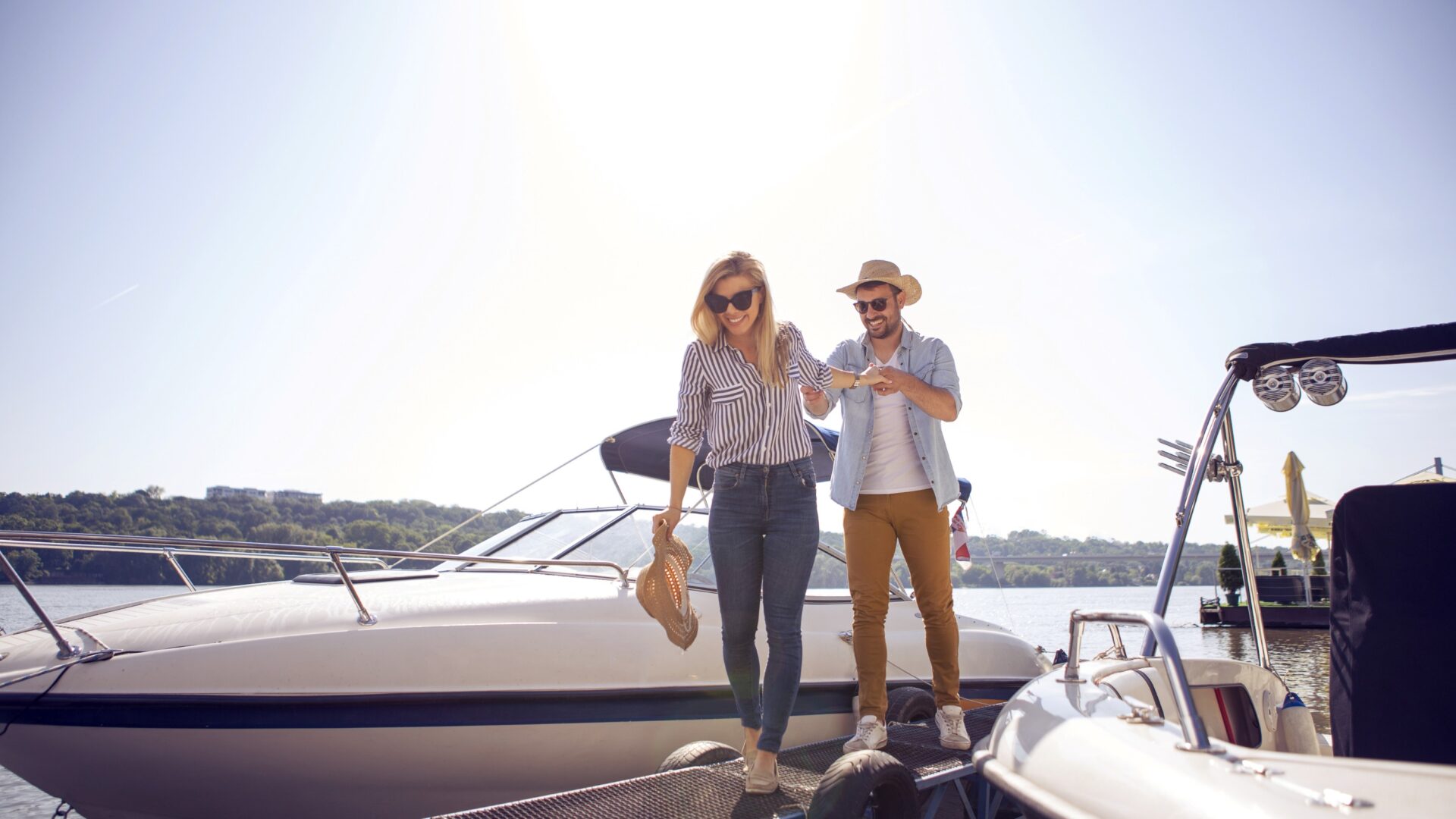 A couple walking off a docked boat