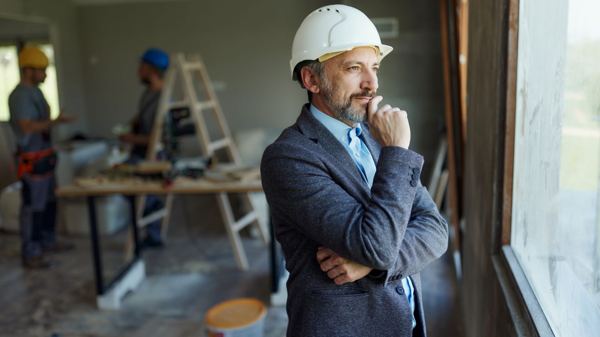businessman considering his property development